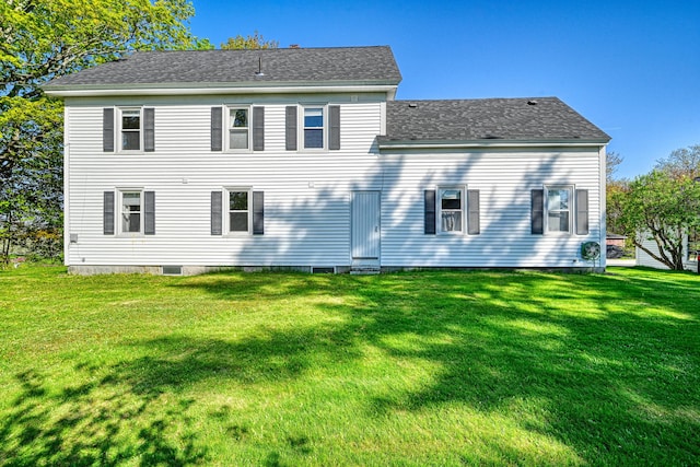 1 High St, Hallowell, ME 04347 - back of property with a lawn and a shingled roof