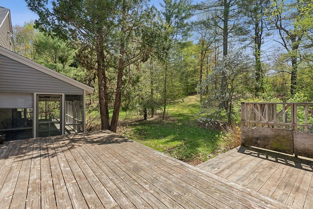 248 Morse Rd, Norway, ME 04268 - wooden deck featuring a sunroom