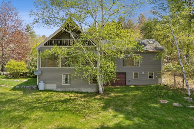 248 Morse Rd, Norway, ME 04268 - rear view of house featuring a yard and a sunroom