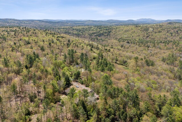 248 Morse Rd, Norway, ME 04268 - aerial view of property's location with a heavily wooded area and a mountainous background