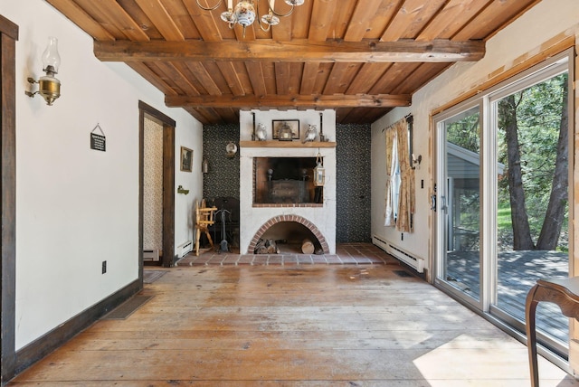 248 Morse Rd, Norway, ME 04268 - unfurnished living room featuring wood-type flooring, a baseboard heating unit, wood ceiling, beam ceiling, and a chandelier