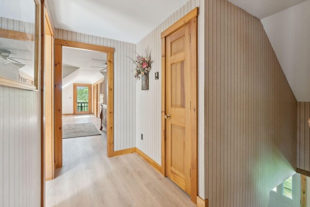 248 Morse Rd, Norway, ME 04268 - hall featuring light wood-style flooring, wallpapered walls, and baseboards