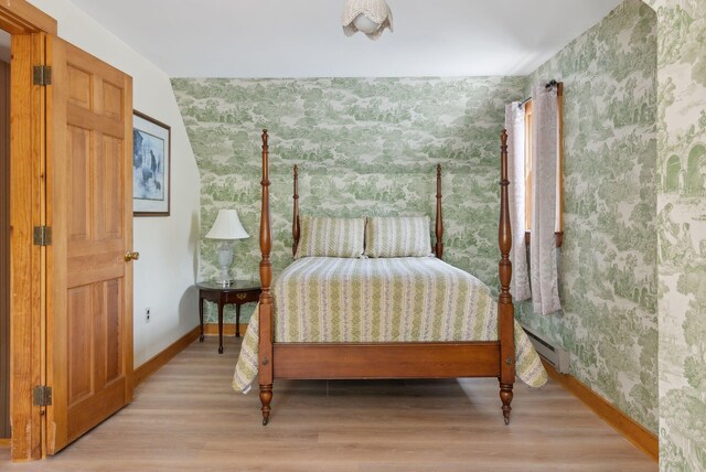 248 Morse Rd, Norway, ME 04268 - bedroom featuring wallpapered walls, baseboards, and light wood-style flooring