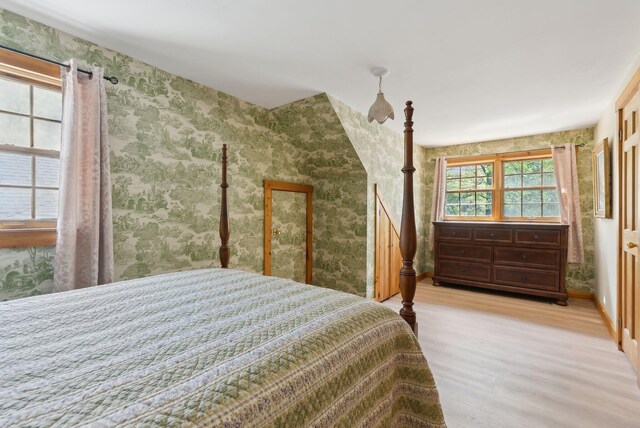 248 Morse Rd, Norway, ME 04268 - bedroom featuring wallpapered walls and wood finished floors