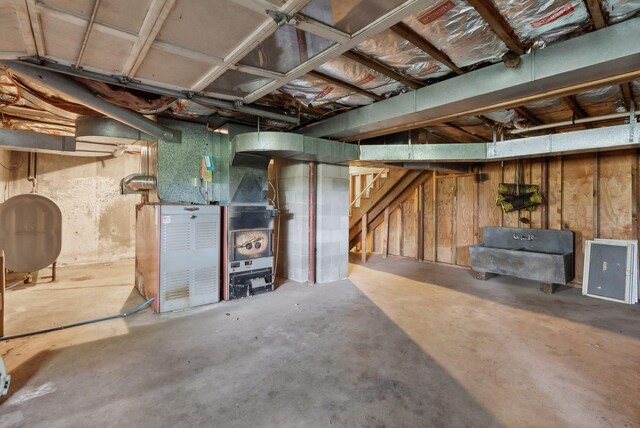 248 Morse Rd, Norway, ME 04268 - unfinished basement featuring heating fuel and stairway