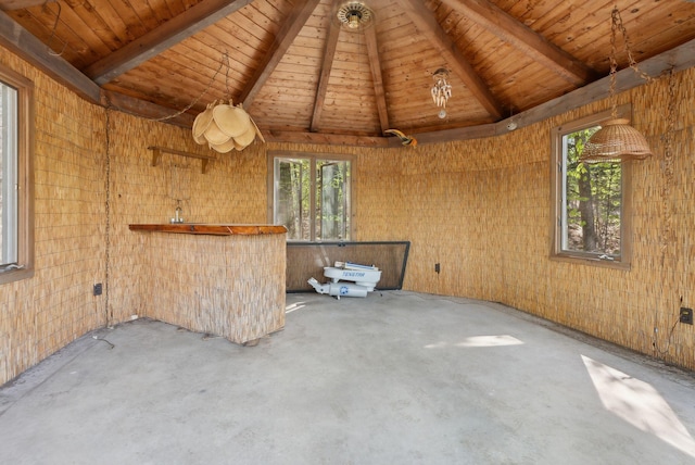 248 Morse Rd, Norway, ME 04268 - unfurnished living room with concrete flooring and wooden ceiling