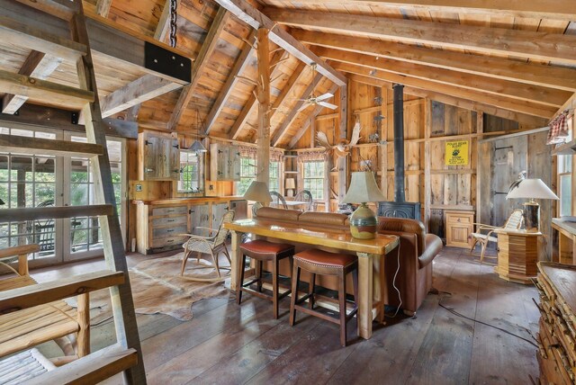 248 Morse Rd, Norway, ME 04268 - miscellaneous room with wood ceiling, wood-type flooring, wood walls, a wood stove, and french doors