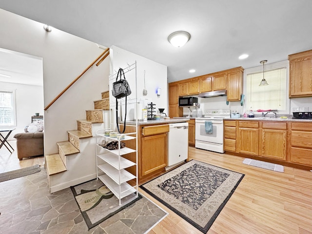 34 Veterans St, Peru, ME 04290 - kitchen featuring white appliances, under cabinet range hood, light countertops, a sink, and recessed lighting