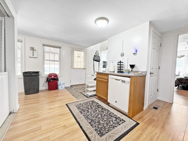 34 Veterans St, Peru, ME 04290 - kitchen with dishwasher, light wood-type flooring, and healthy amount of natural light