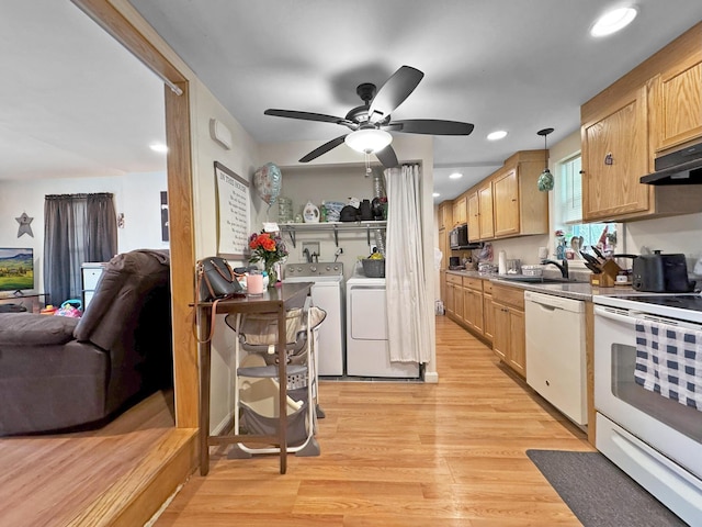 34 Veterans St, Peru, ME 04290 - kitchen with white appliances, washer and clothes dryer, a sink, ceiling fan, and light wood-type flooring