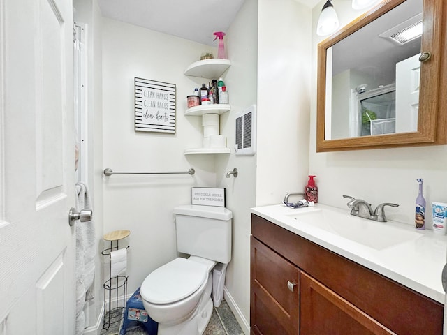 34 Veterans St, Peru, ME 04290 - full bathroom featuring toilet, vanity, baseboards, and an enclosed shower