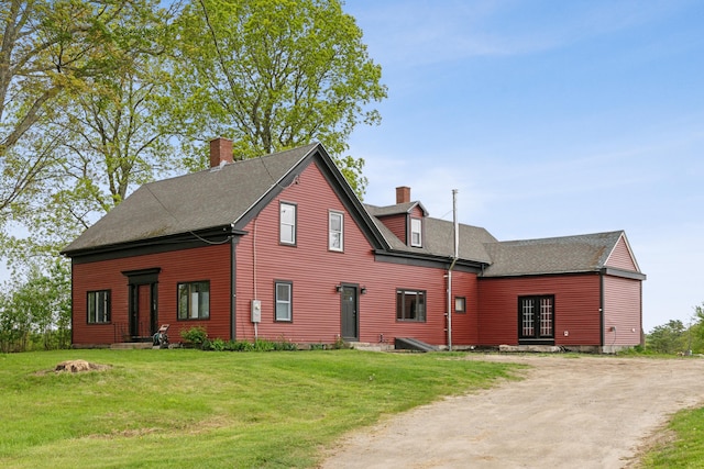 692 S St, Biddeford, ME 04005 - view of front of home featuring a chimney, a front lawn, entry steps, and roof with shingles