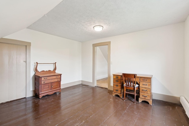 692 S St, Biddeford, ME 04005 - home office with wood-type flooring and a baseboard heating unit