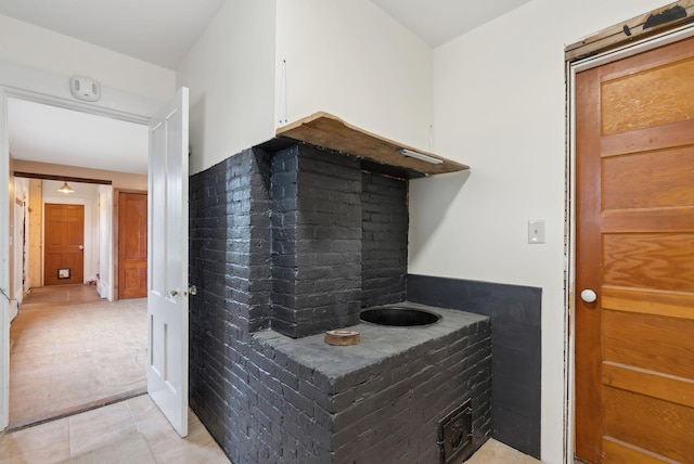 692 S St, Biddeford, ME 04005 - laundry room with light tile patterned floors