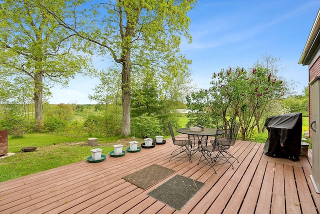 692 S St, Biddeford, ME 04005 - wooden terrace featuring outdoor dining area and a yard