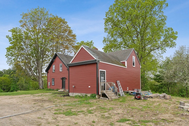 692 S St, Biddeford, ME 04005 - view of property exterior featuring a shingled roof