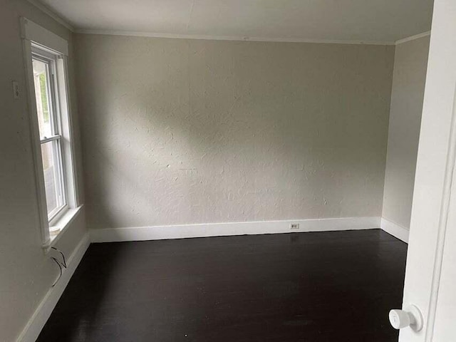 30 Patterson St, Augusta, ME 04330 - empty room featuring baseboards, ornamental molding, and dark wood-style floors