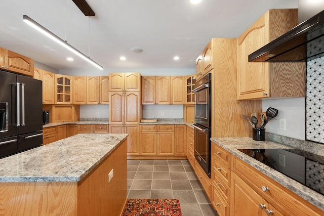 45AND57 Southgate Rd, Kennebunk, ME 04043 - kitchen with black appliances, recessed lighting, light stone countertops, glass insert cabinets, and under cabinet range hood