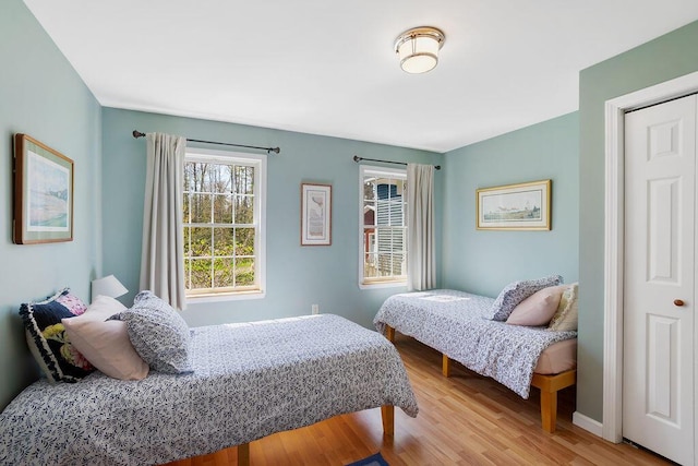 45AND57 Southgate Rd, Kennebunk, ME 04043 - bedroom featuring light wood finished floors and baseboards