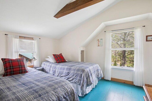 45AND57 Southgate Rd, Kennebunk, ME 04043 - bedroom with vaulted ceiling, baseboards, and wood finished floors