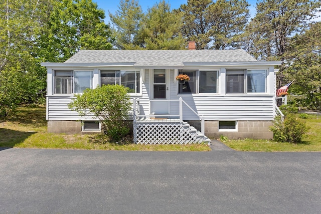 19 Fairhaven Ave, Saco, ME 04072 - view of front of property with roof with shingles and a chimney