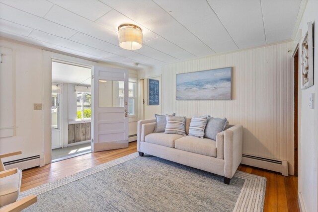 19 Fairhaven Ave, Saco, ME 04072 - living room with a baseboard radiator and wood finished floors