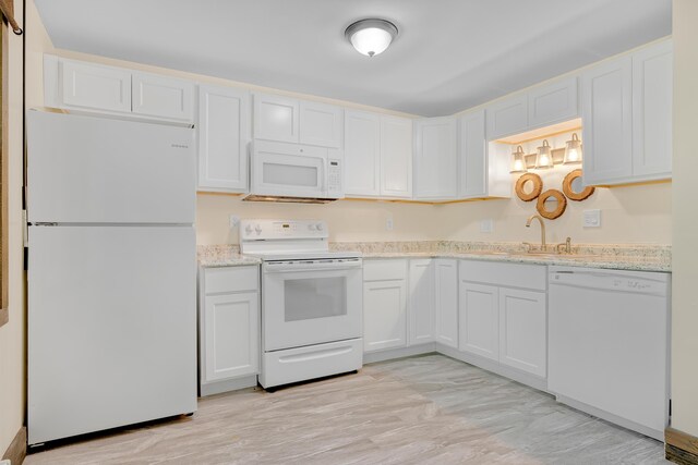10 E Pinnacle Rd Unit 10, Bridgton, ME 04009 - kitchen with white appliances, a sink, and white cabinetry