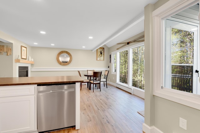 10 E Pinnacle Rd Unit 10, Bridgton, ME 04009 - kitchen featuring dishwasher, a baseboard heating unit, white cabinets, light wood finished floors, and dark countertops