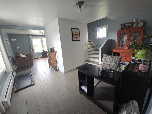 6 Linden St, Waterville, ME 04901 - living room featuring stairs, wood-type flooring, and baseboards