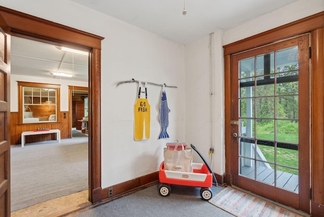 14 Oak St, Kennebunk, ME 04043 - doorway to outside with healthy amount of natural light and carpet flooring