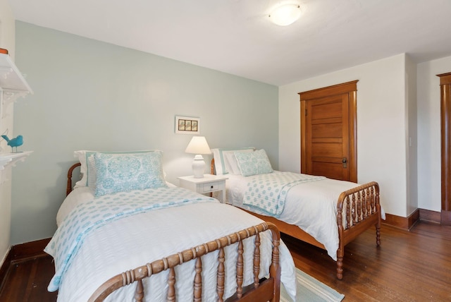 14 Oak St, Kennebunk, ME 04043 - bedroom featuring baseboards and wood finished floors