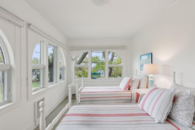 14 Oak St, Kennebunk, ME 04043 - bedroom with multiple windows and baseboards