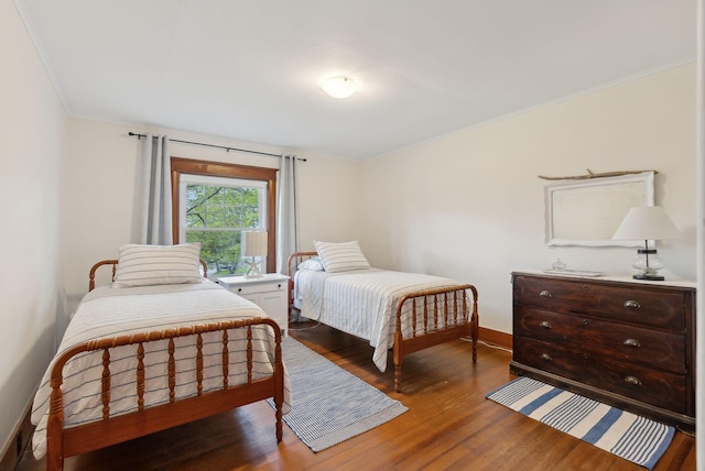 14 Oak St, Kennebunk, ME 04043 - bedroom featuring wood finished floors, crown molding, and baseboards