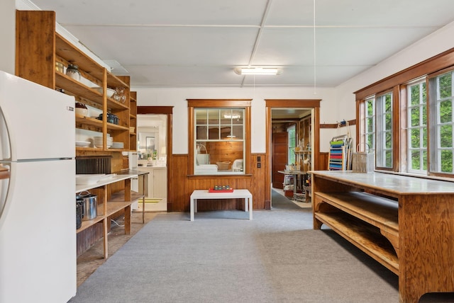 14 Oak St, Kennebunk, ME 04043 - living area with wainscoting, carpet floors, and wooden walls