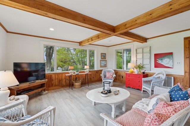 14 Oak St, Kennebunk, ME 04043 - living room with light wood-type flooring, wainscoting, beam ceiling, wooden walls, and ornamental molding