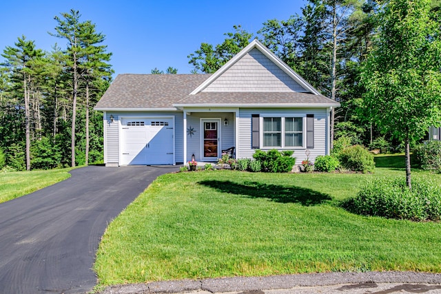 6 D St, Bridgton, ME 04009 - view of front of home with a garage, asphalt driveway, a shingled roof, and a front lawn