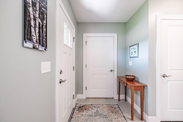 6 D St, Bridgton, ME 04009 - doorway with baseboards and light tile patterned floors