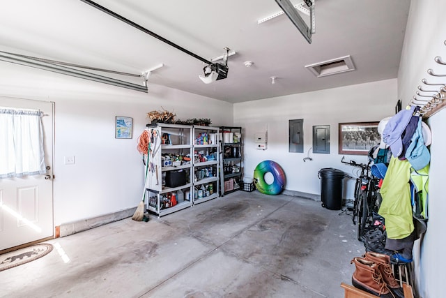 6 D St, Bridgton, ME 04009 - garage with electric panel and a garage door opener