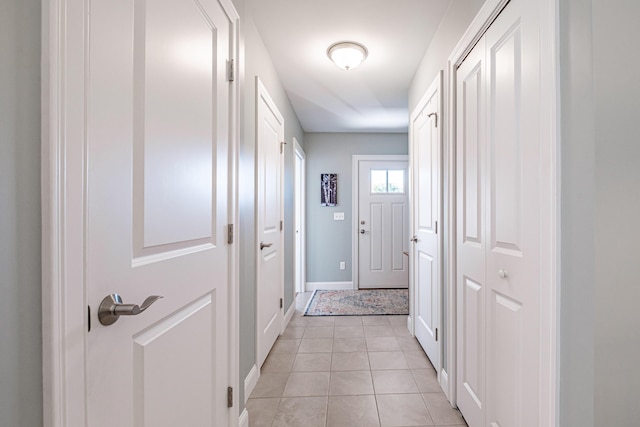 6 D St, Bridgton, ME 04009 - doorway featuring baseboards and light tile patterned flooring