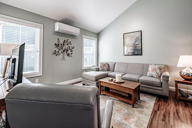 6 D St, Bridgton, ME 04009 - living area with a wall mounted AC, wood finished floors, vaulted ceiling, and baseboards