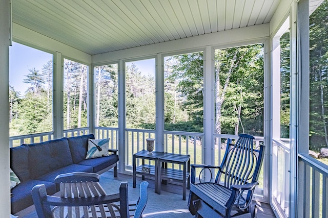 6 D St, Bridgton, ME 04009 - sunroom featuring an outdoor hangout area, healthy amount of natural light, and view of scattered trees