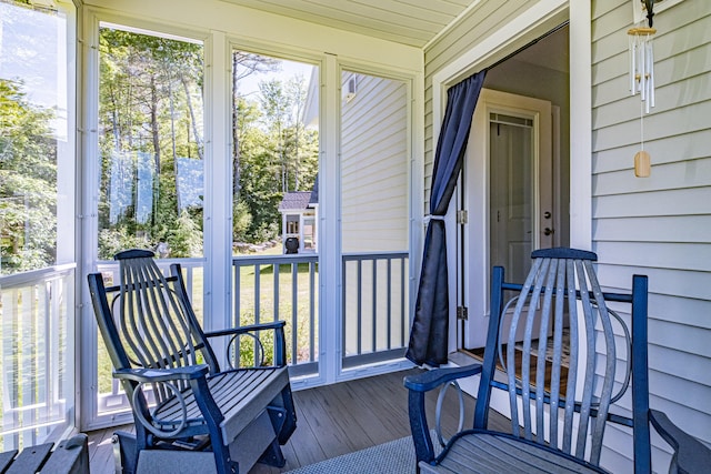 6 D St, Bridgton, ME 04009 - sunroom featuring plenty of natural light and view of scattered trees