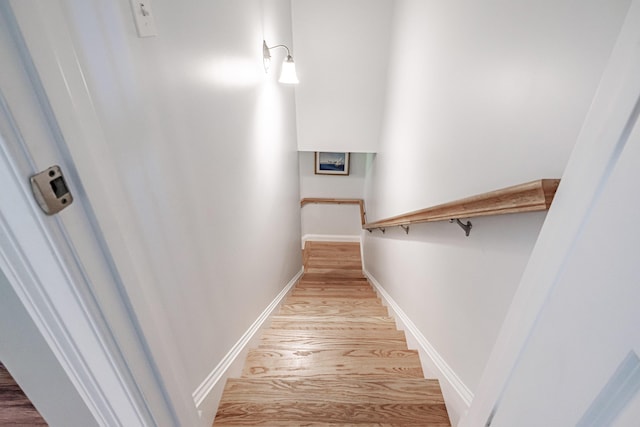 6 D St, Bridgton, ME 04009 - stairway featuring wood finished floors and baseboards