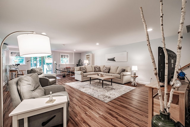 6 D St, Bridgton, ME 04009 - living area featuring healthy amount of natural light, wood finished floors, recessed lighting, and baseboards