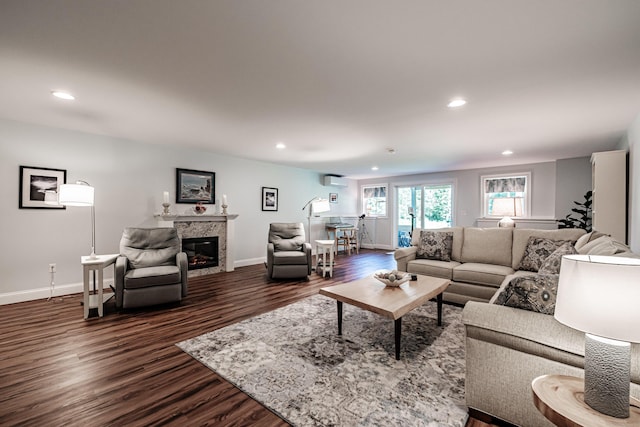 6 D St, Bridgton, ME 04009 - living room featuring dark wood-style floors, baseboards, a glass covered fireplace, and recessed lighting