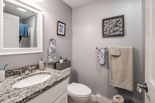 6 D St, Bridgton, ME 04009 - bathroom featuring vanity, toilet, and baseboards