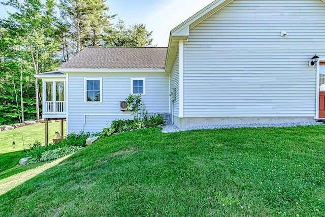 6 D St, Bridgton, ME 04009 - view of home's exterior featuring a yard and roof with shingles