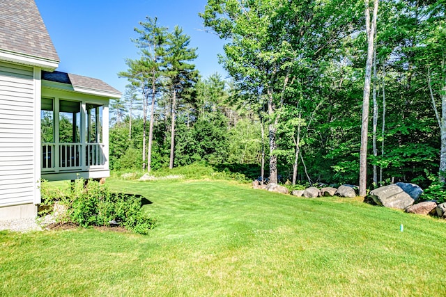 6 D St, Bridgton, ME 04009 - view of green lawn with a sunroom