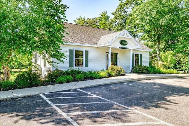6 D St, Bridgton, ME 04009 - view of front of home featuring uncovered parking and roof with shingles