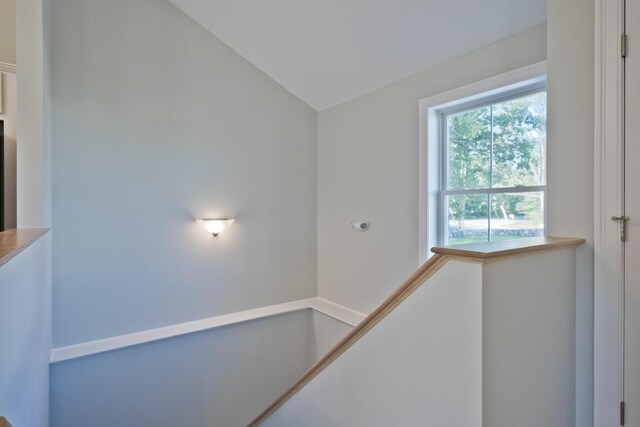 6 D St, Bridgton, ME 04009 - hallway with an upstairs landing and vaulted ceiling